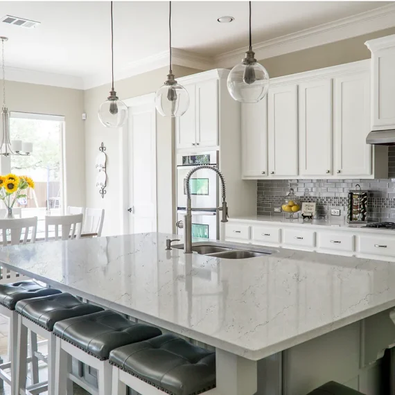 Mystique Polished Pental Quartz kitchen island countertop, showcasing its elegant veining and durability for a modern kitchen.