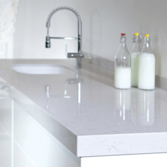 Elegant white Silestone countertop, adding a touch of sophistication and easy maintenance to any kitchen.