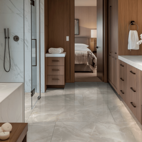 Luxurious bathroom featuring Calacatta Premata Premium Natural Quartz on vanity countertops, tub surround, and shower walls, creating a seamless marble-like aesthetic.