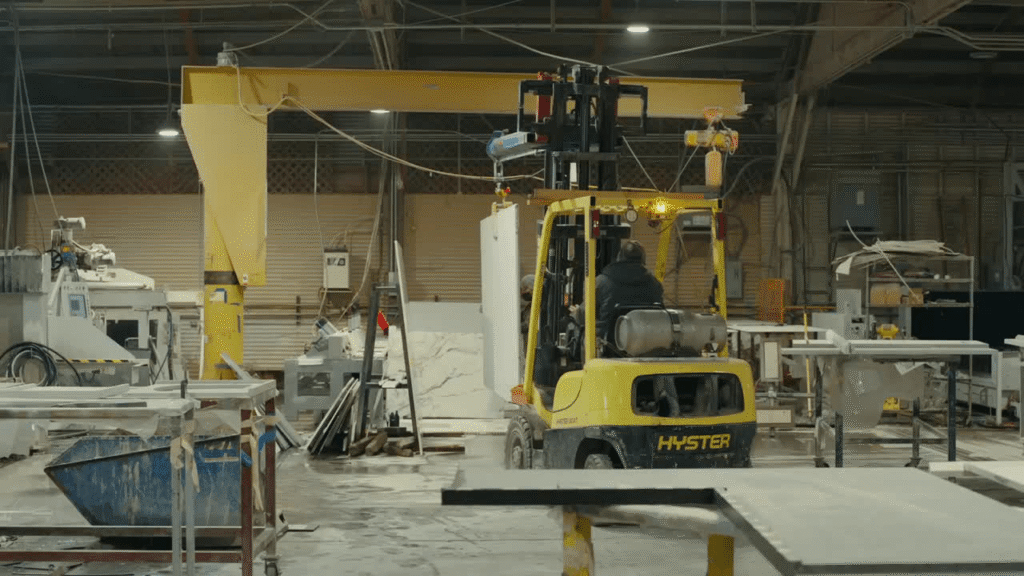 Precision stone fabrication for FreePower™ wireless charging countertops, demonstrating custom integration and expert craftsmanship by Arlington Marble, Fort Worth.